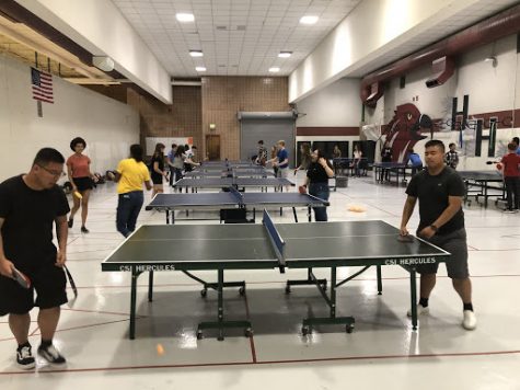 It was a packed room after school at ping pong club.