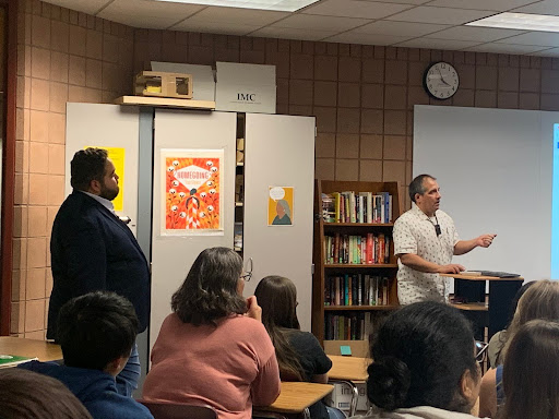 Greg Sanchez (right) presents to English Natl. Honors Society about the state mushroom, being observed by Said Sharbini (left). Photo taken by Grace Hilliard
