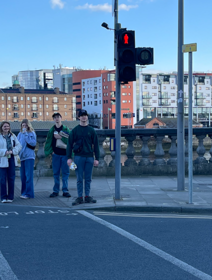 Taken Mar 15, 2025 in Limerick, Ireland during the 2025 Music Ireland Trip. It depicts Casey, a now alumni of the HHS band, waiting for the pedestrian light to allow him to cross. 