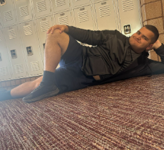 Photograph of an individual that would be considered to have a ‘negative’ body type.